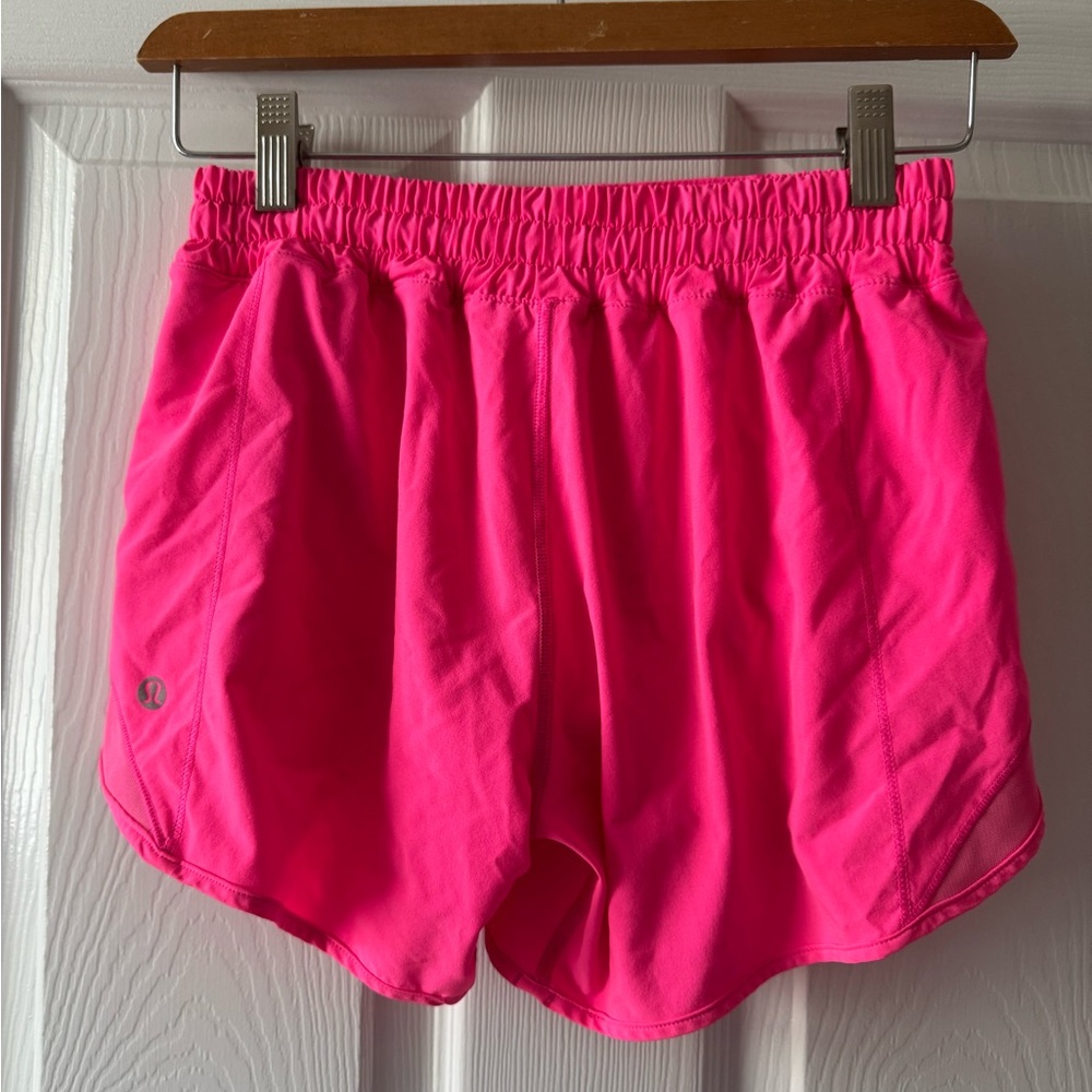 Lululemon Hotty Hot Low-Rise Lined Short 4” 
Size: 4 Tall
Color: Dark Prism Pink